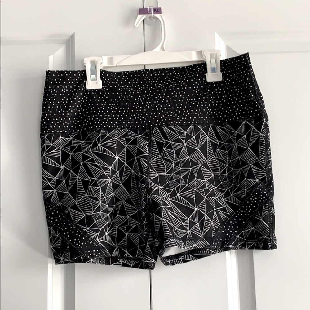Scorpio Sol black and white knit workout shorts